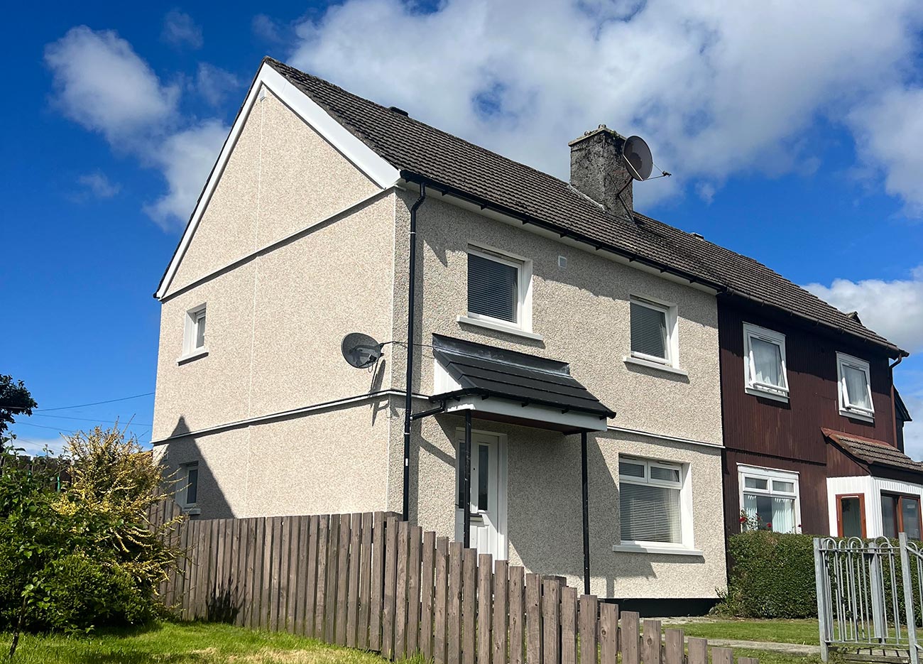Swedish Timber, Dalry: rendered semi-detached house with a dark tiled roof