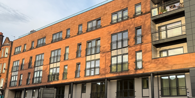 Butterbiggins Road, Glasgow: block of flats with orange cladding and balconies