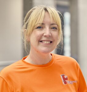 Jenny Kitchen wearing a Constructive Futures T-shirt